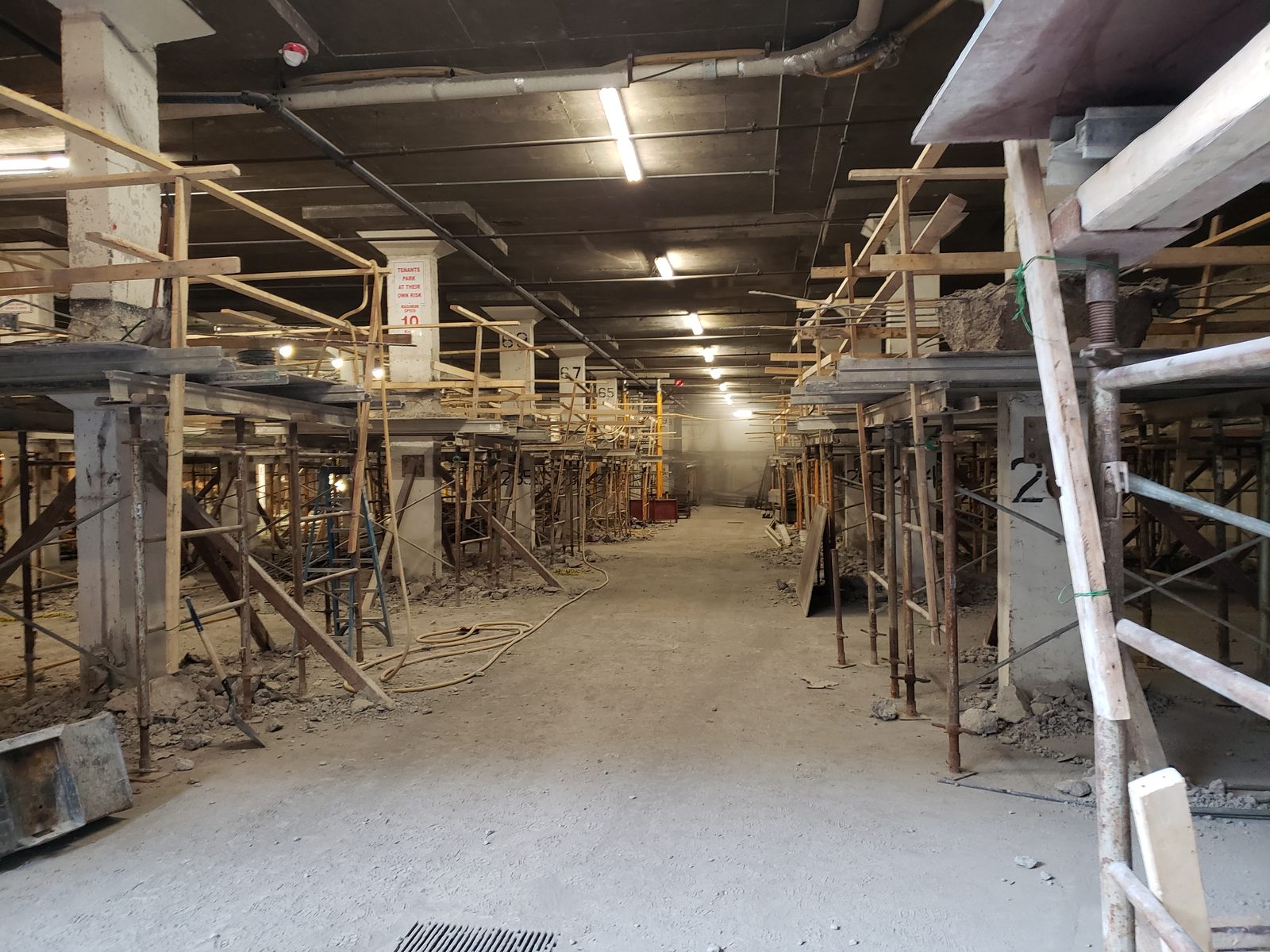 Delbridge Contracting shoring in place across a parking structure during intermediate slab replacement